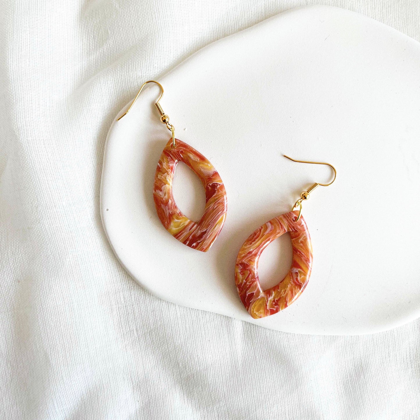 Pointed Ovals in Red and Orange Marble