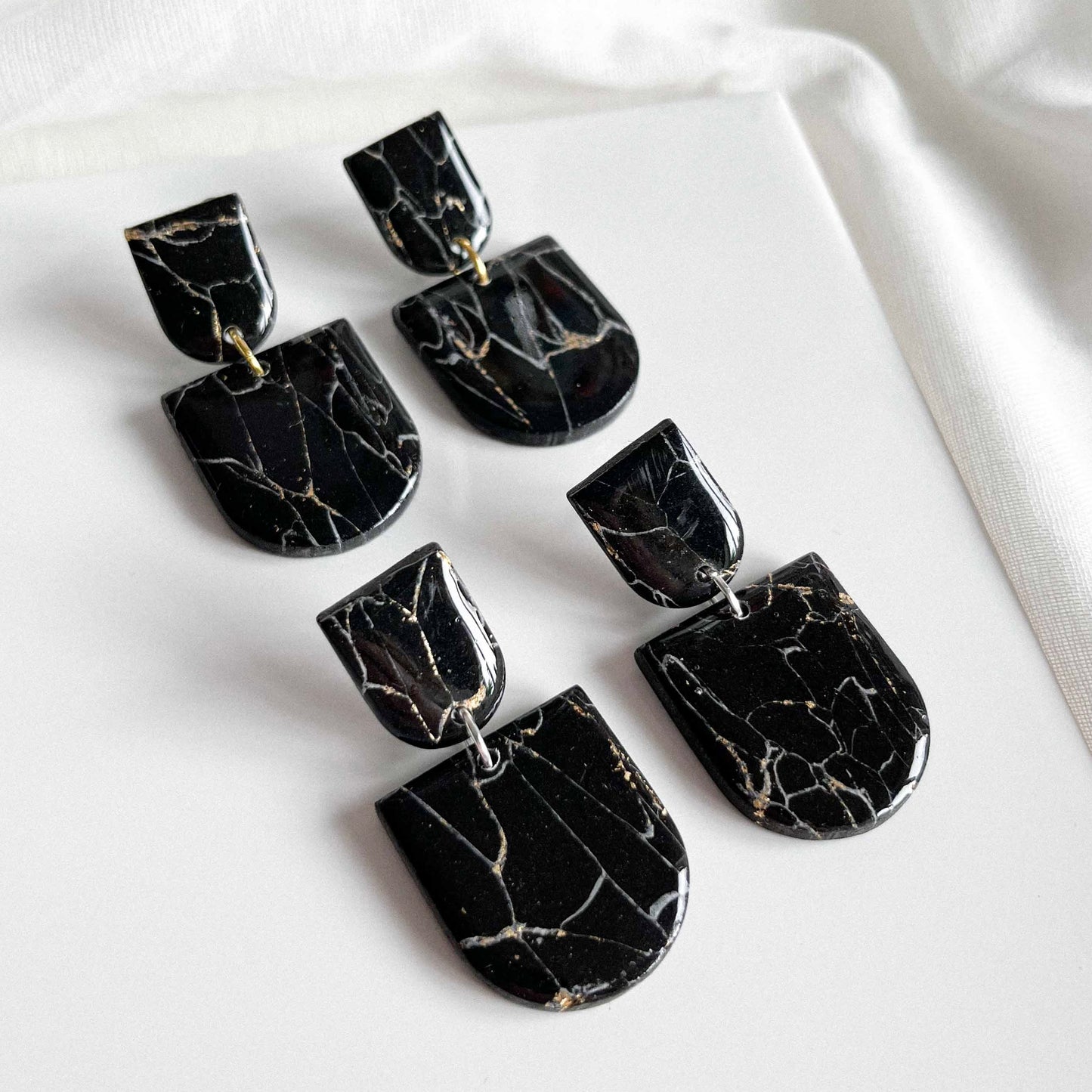 Arch Studs in Black Howlite