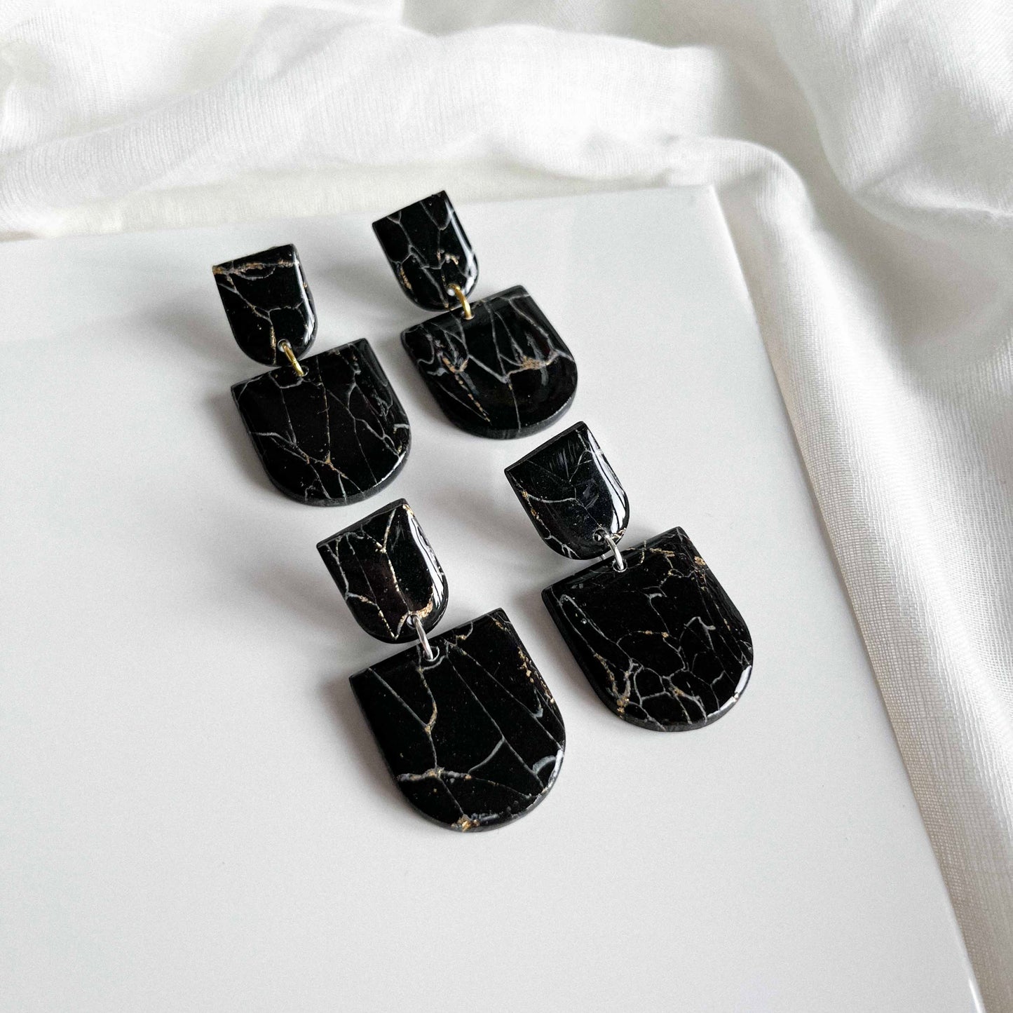 Arch Studs in Black Howlite